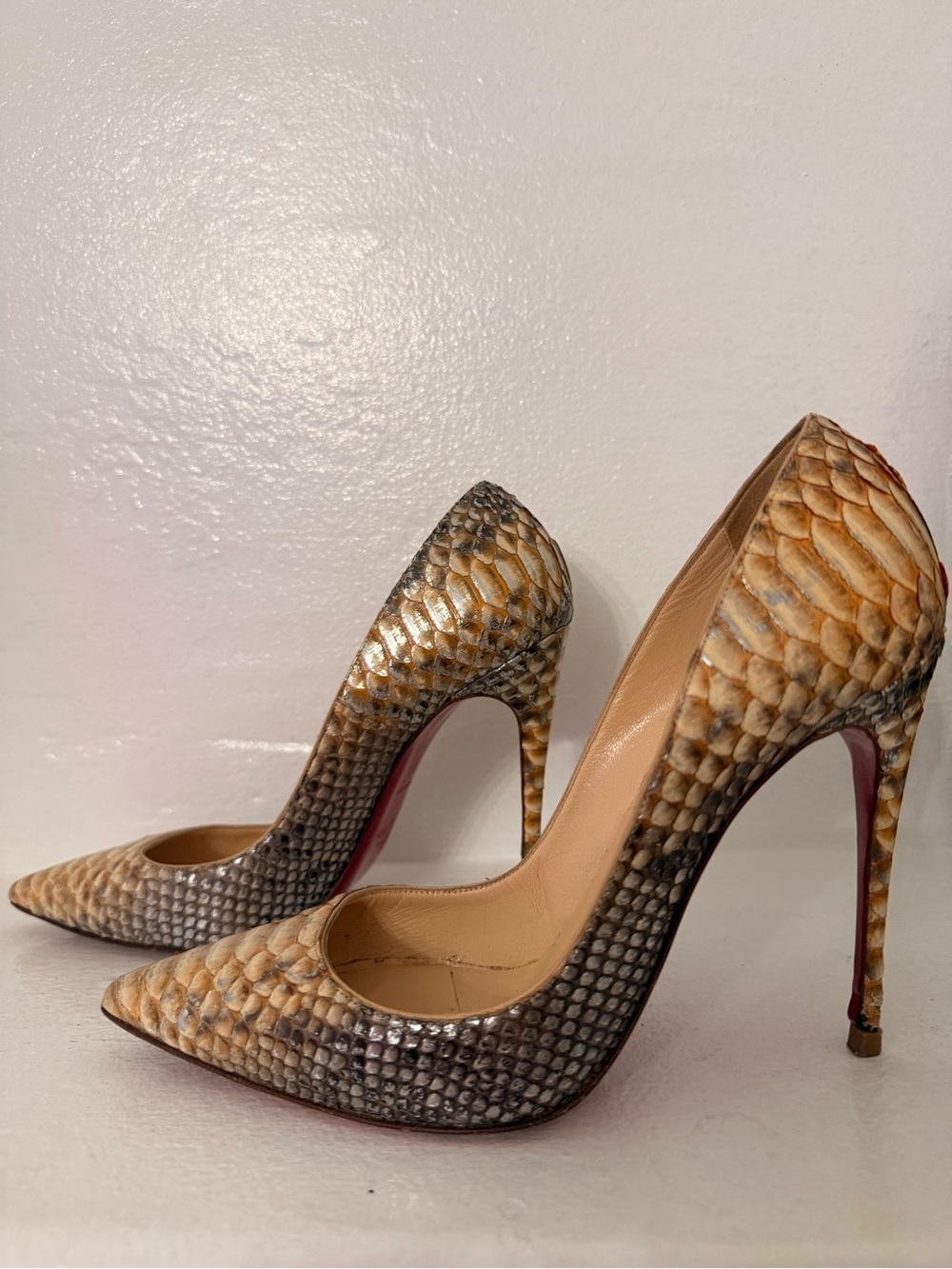 Christian Louboutin heels featuring an exotic python/snake skin pattern